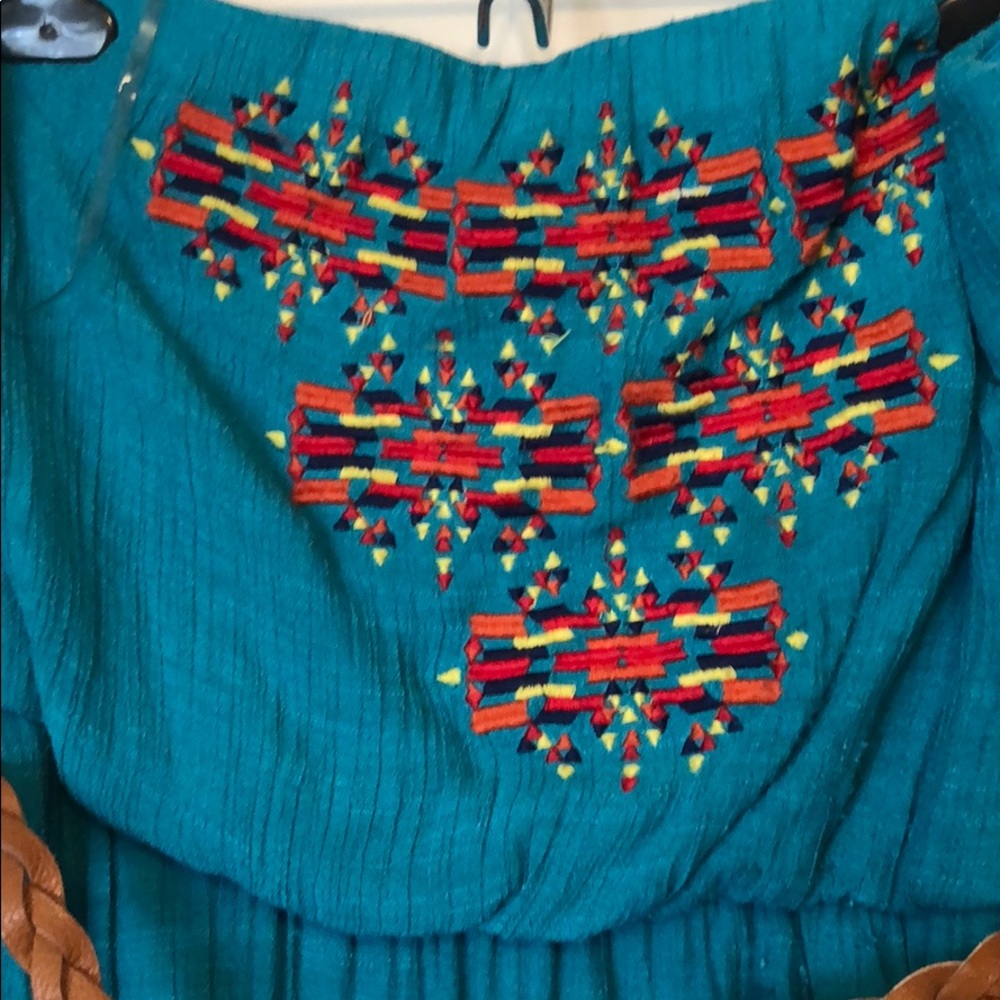 Teal dress with Aztec style stitched pattern